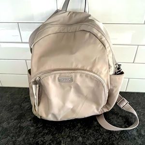 Kate spade back pack in Grey.